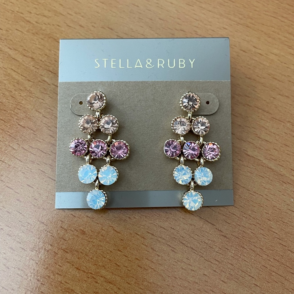 Gold colored and crystal earrings